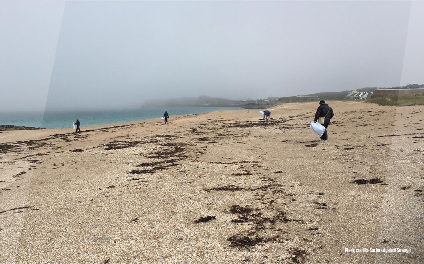Litter pickers trying to clear our UK beaches from waste and discarded litter